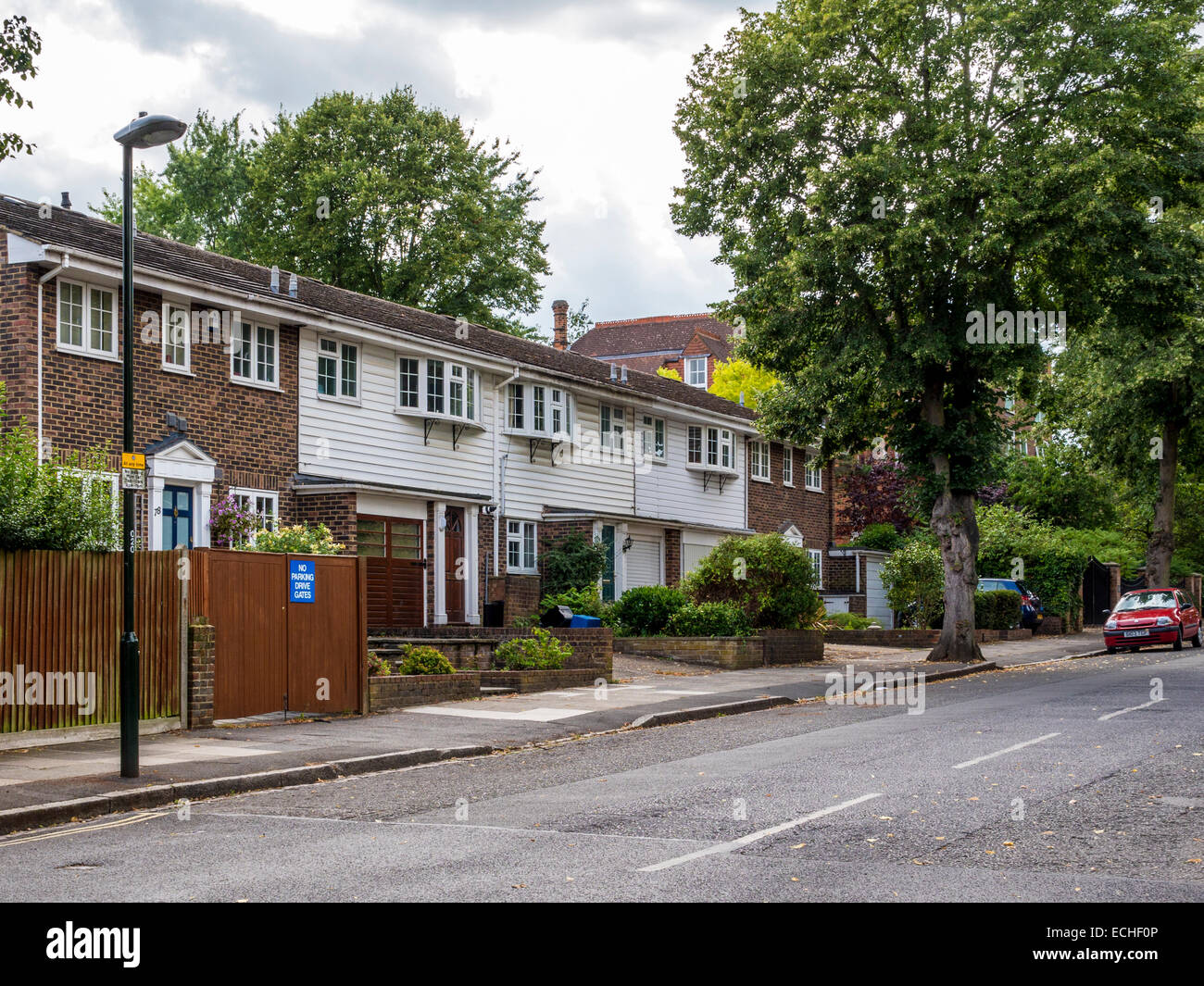 Terraced suburban new build housing Strawberry Hill, Twickenham, UK