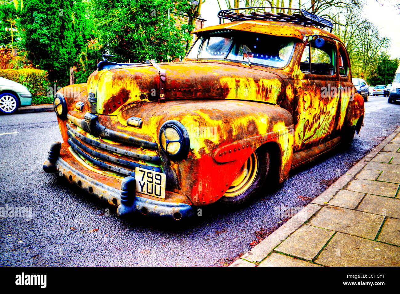 Ford super deluxe 8 V8 old  rusty car wreck 1947 classic parked rust rusted pitted unkempt unloved uncared for not looked after Stock Photo