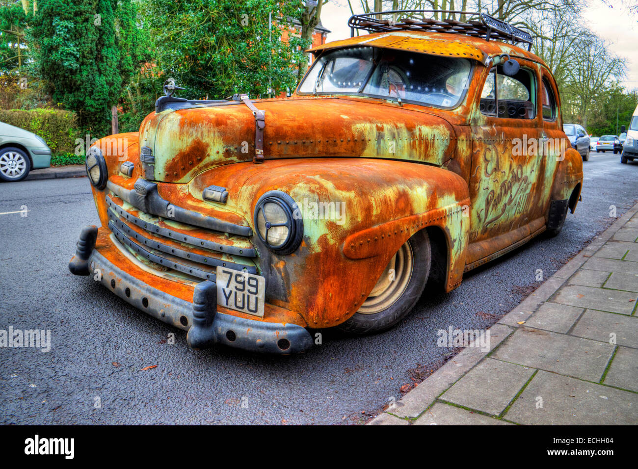Ford super deluxe 8  V8 old rusty car wreck 1947 classic parked rust rusted pitted unkempt unloved uncared for not looked after Stock Photo