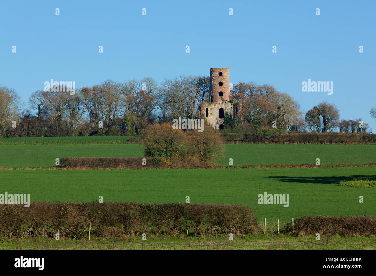 Old Folly standing on a hill. Racton ruin showing signs of decay. Stock Photo