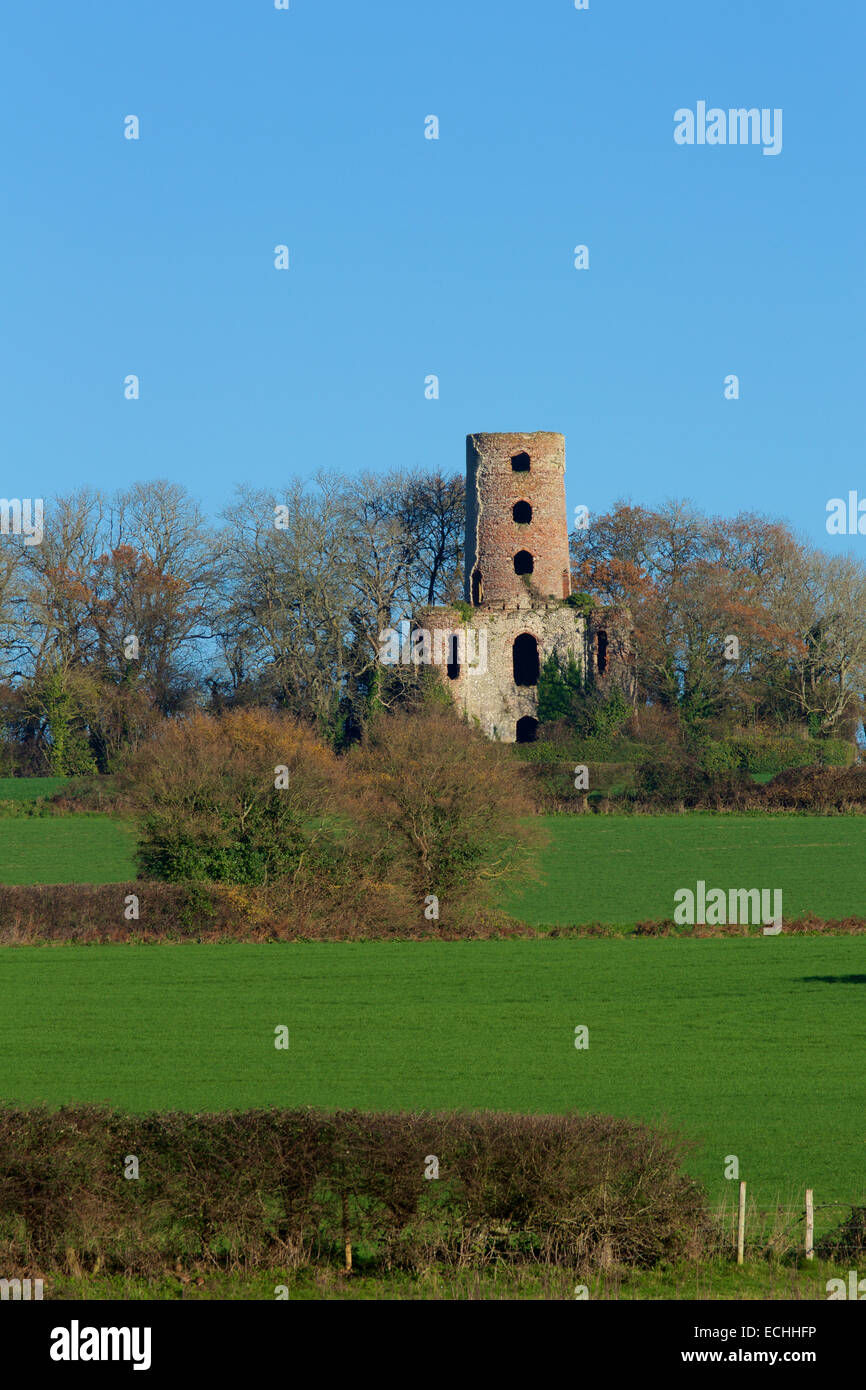 Old Folly standing on a hill. Racton ruin showing signs of decay. Stock Photo