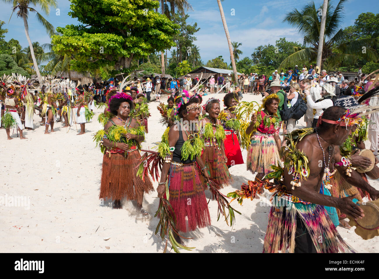 Melanesia, Papua New Guinea. Small island of Ali off the coast of mainland PNG. Local villagers in traditional attire dancing. Stock Photo