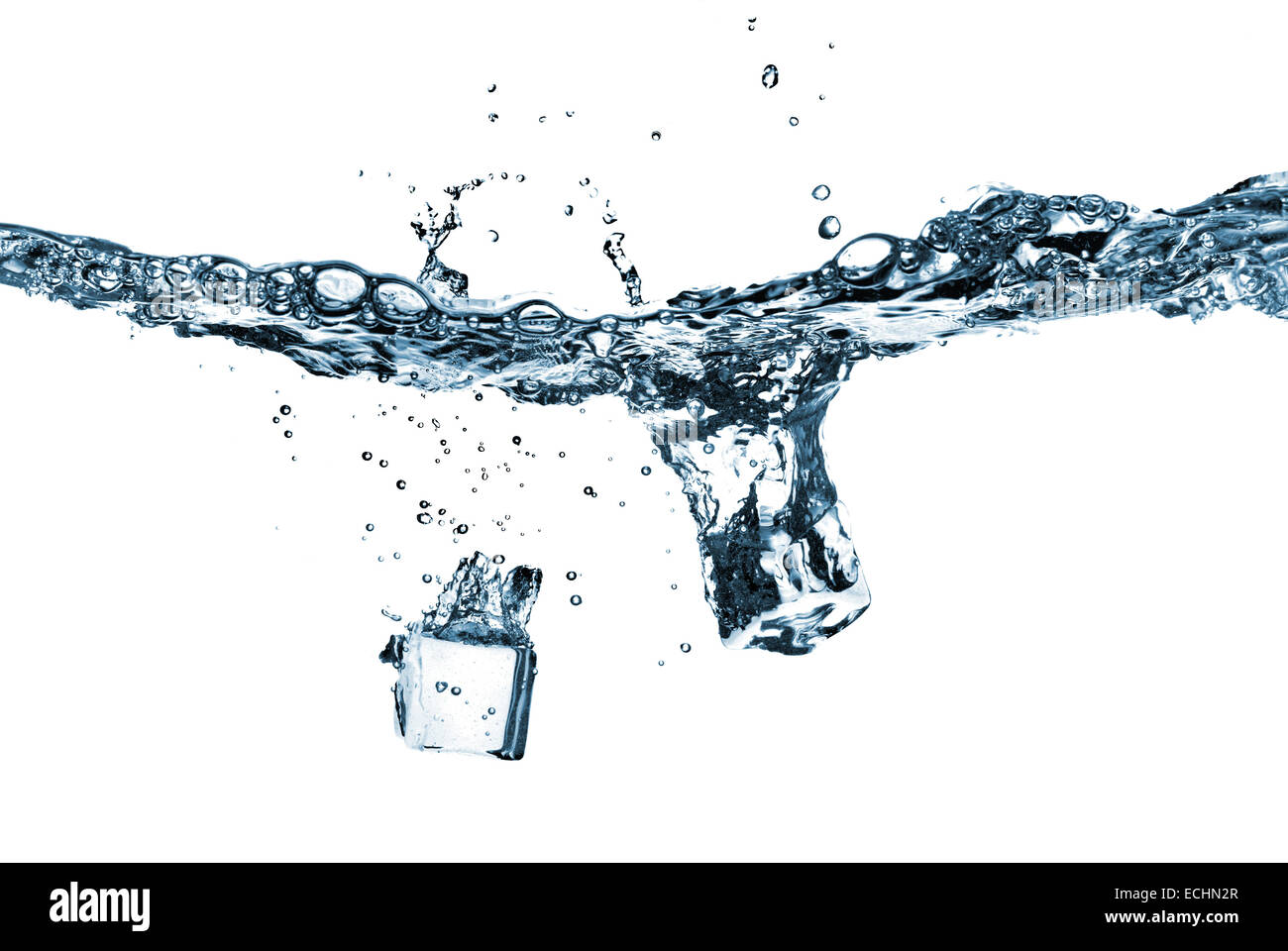 ice cubes dropped into water with splash isolated on white Stock Photo ...