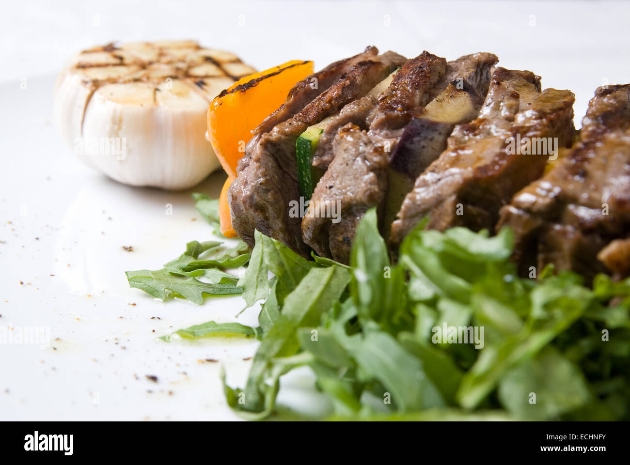 shashlik with potherbs on the plate Stock Photo