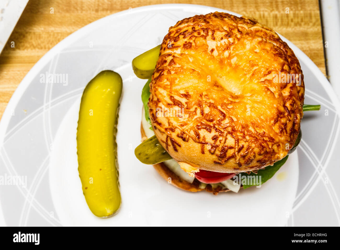 A Cheeseburger on a mozzarella cheese topped bagel Stock Photo Alamy