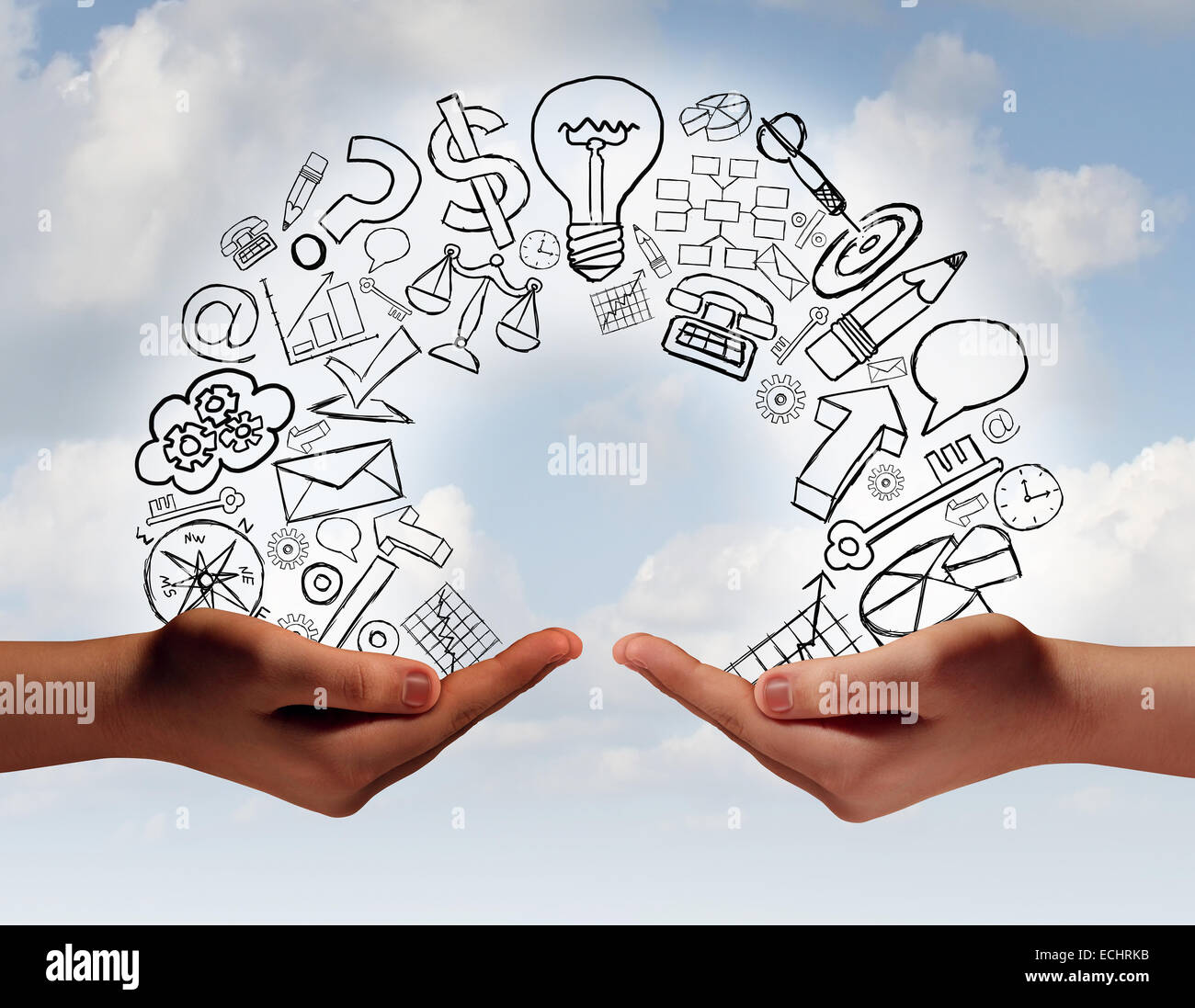 Business exchange concept as two human hands from diverse cultural backgrounds exchanging financial and economic information and training as a metaphor for team success. Stock Photo