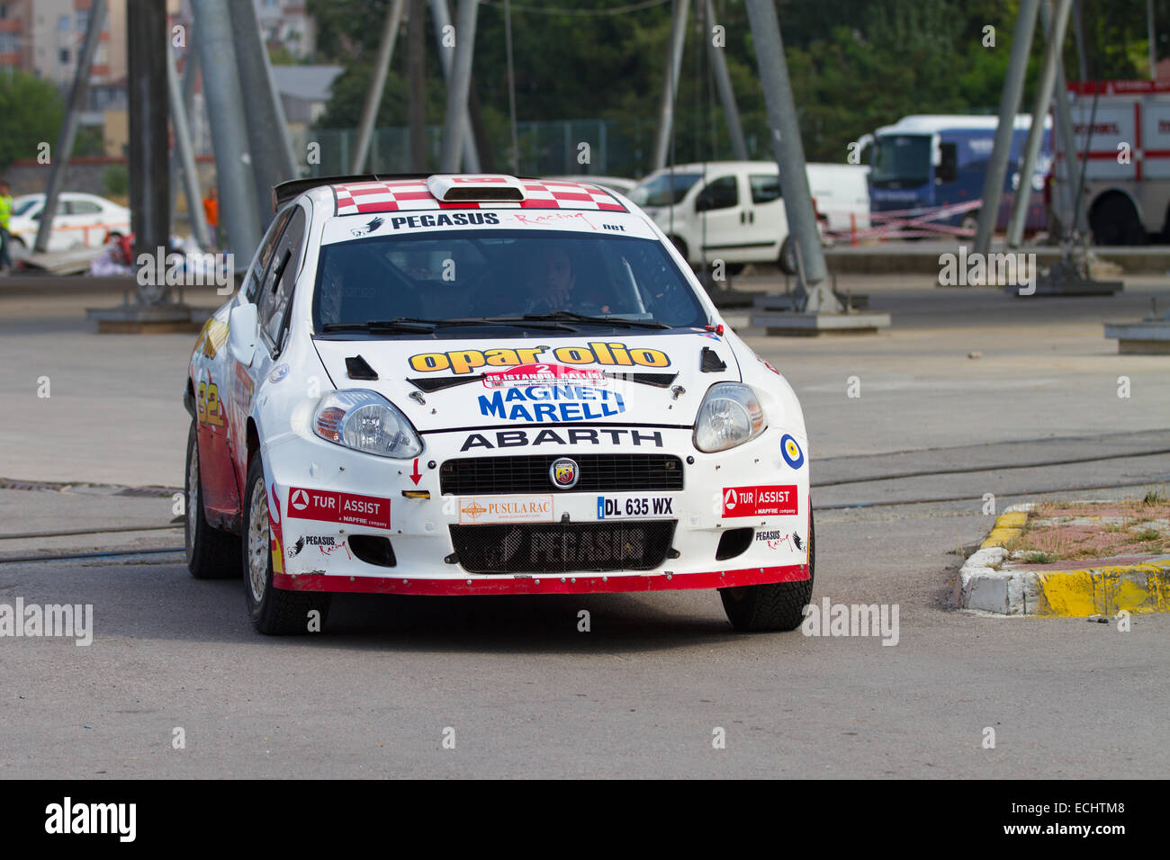 ISTANBUL, TURKEY - JULY 13, 2014: Fatih Kara with Fiat Grande Punto S2000  of Pegasus Racing Team in service area of 35. Istanbul Stock Photo - Alamy