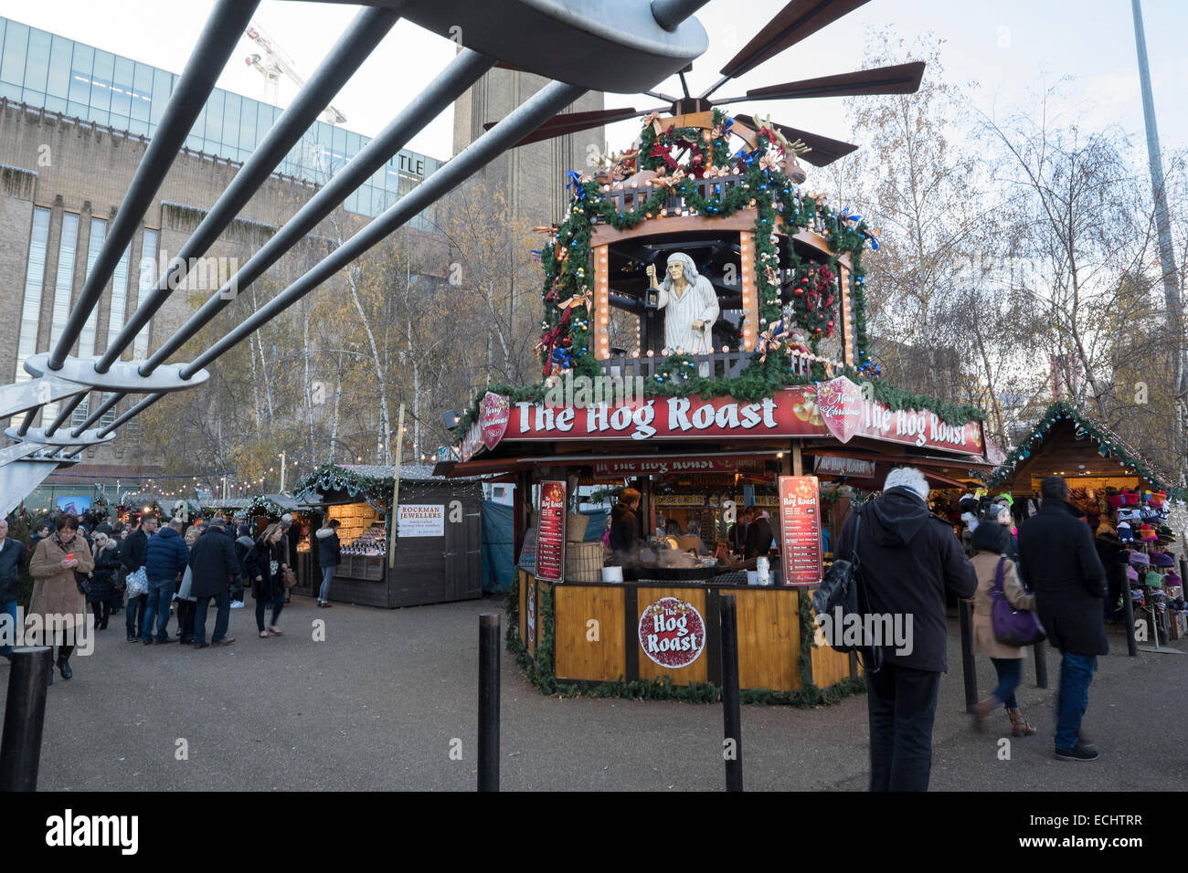 Hog roast stall at the Tate Modern Christmas Market in London, UK Stock