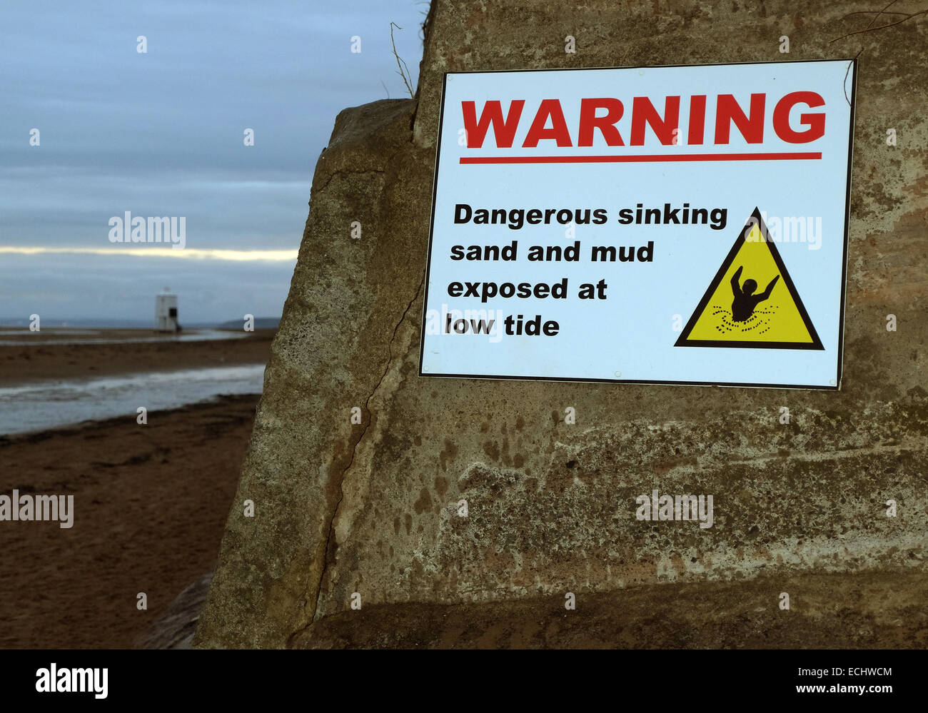Warning sign for dangerous sinking mud on the beach at Burnham on Sea