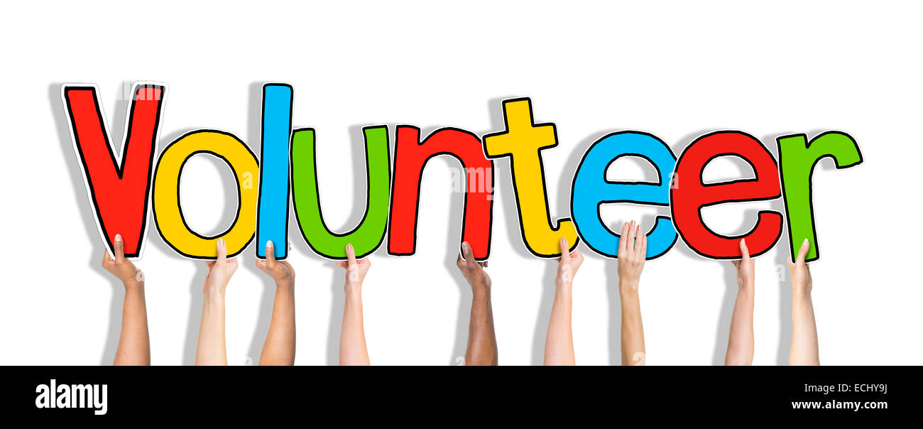 Group of Hands Holding Letter Volunteer Stock Photo - Alamy