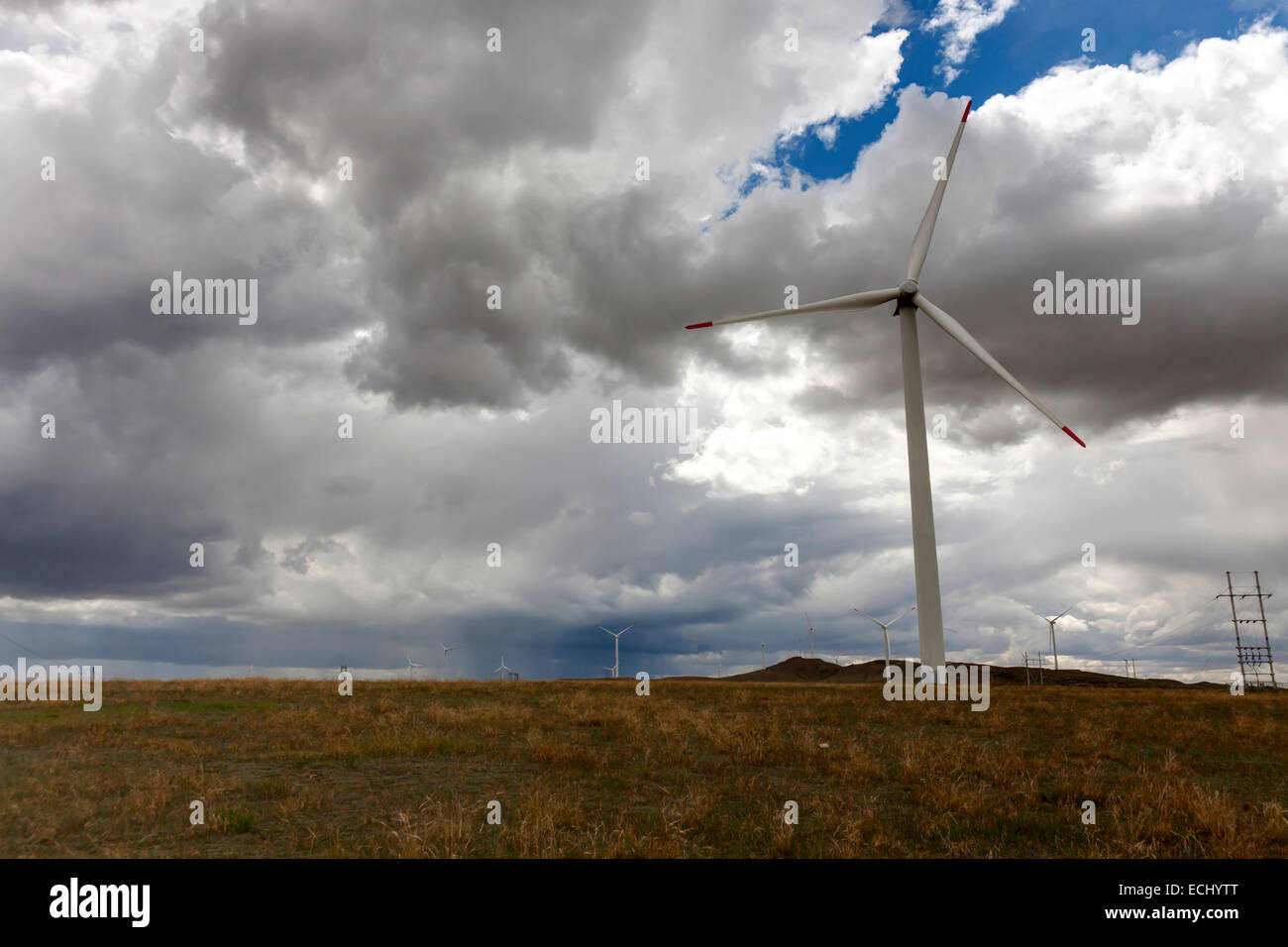 wind turbines and cloudy sky Stock Photo