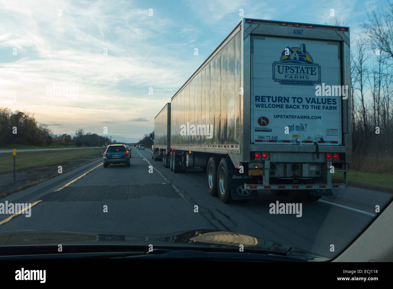 Tractor pulling double trailers Stock Photo Alamy