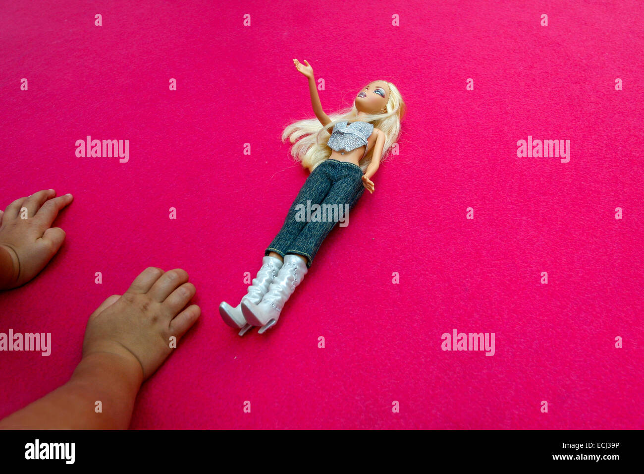 Barbie doll kid hands Stock Photo Alamy