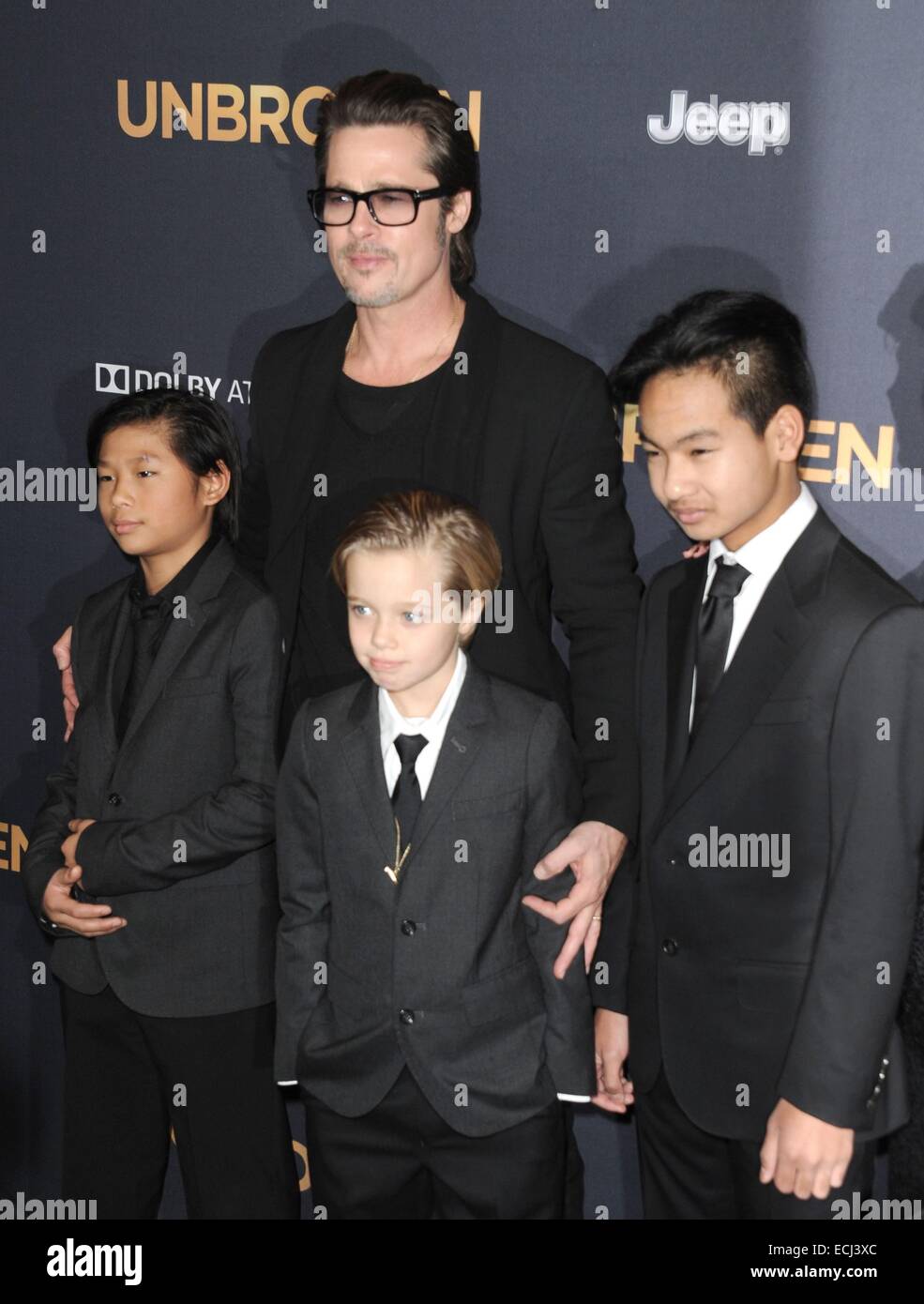 Los Angeles, CA, USA. 15th Dec, 2014. Brad Pitt, Pax Thien Jolie-Pitt, Shiloh Nouvel Jolie-Pitt, Maddox Jolie-Pitt at arrivals for UNBROKEN Premiere, TCL Chinese 6 Theatres (formerly Grauman's), Los Angeles, CA December 15, 2014. Credit:  Dee Cercone/Everett Collection/Alamy Live News Stock Photo