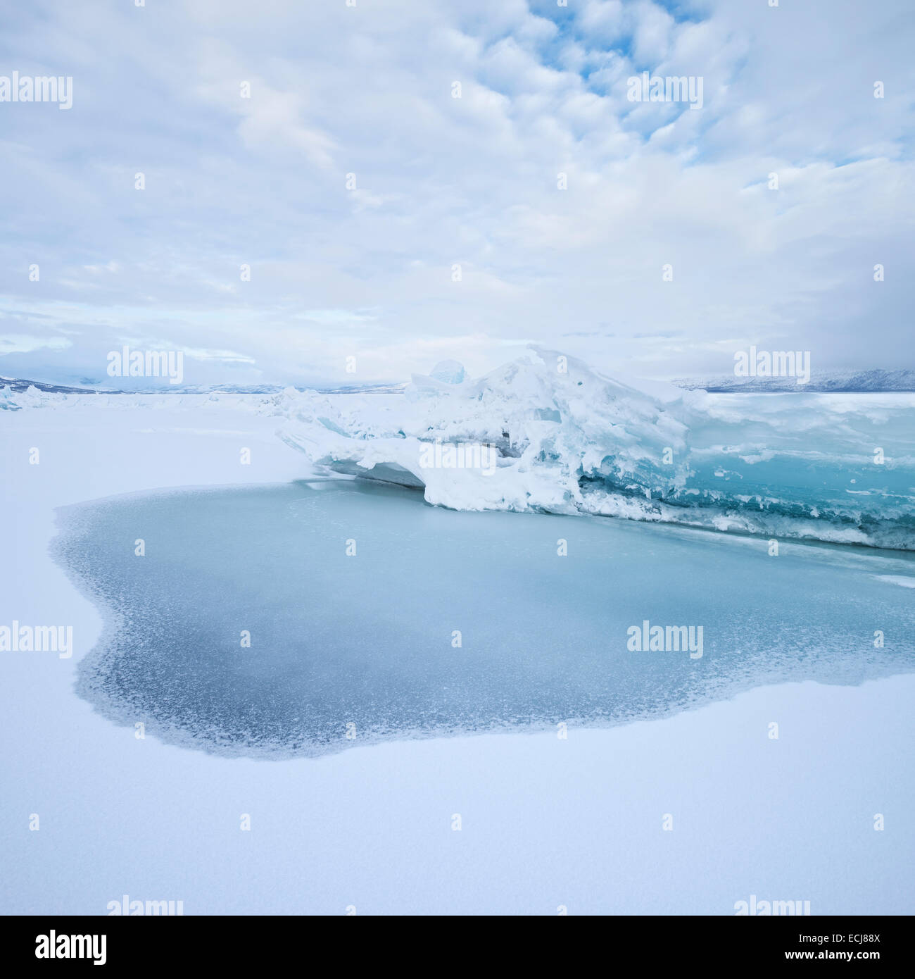 Ice rift on frozen lake Torneträsk in winter, Abisko national park, Lapland, Sweden Stock Photo