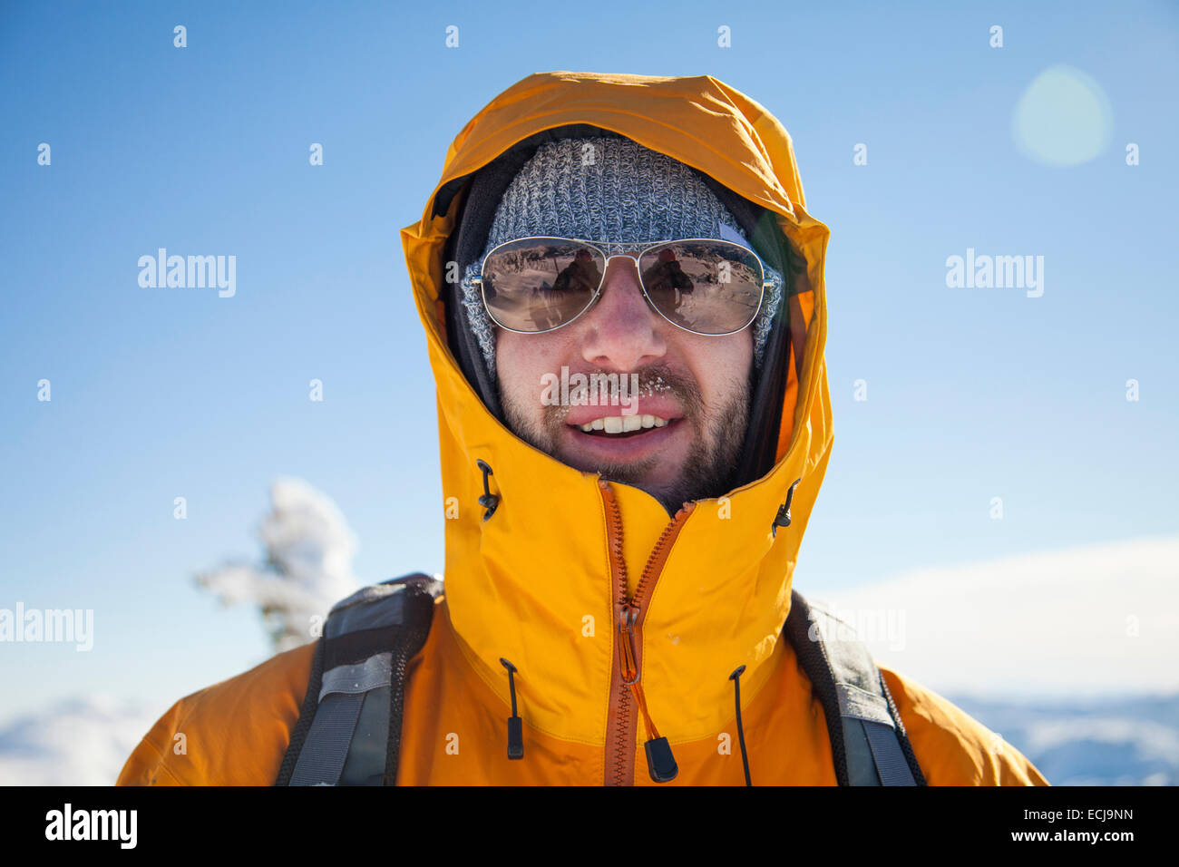 Portrait of man while mountaineering Stock Photo Alamy