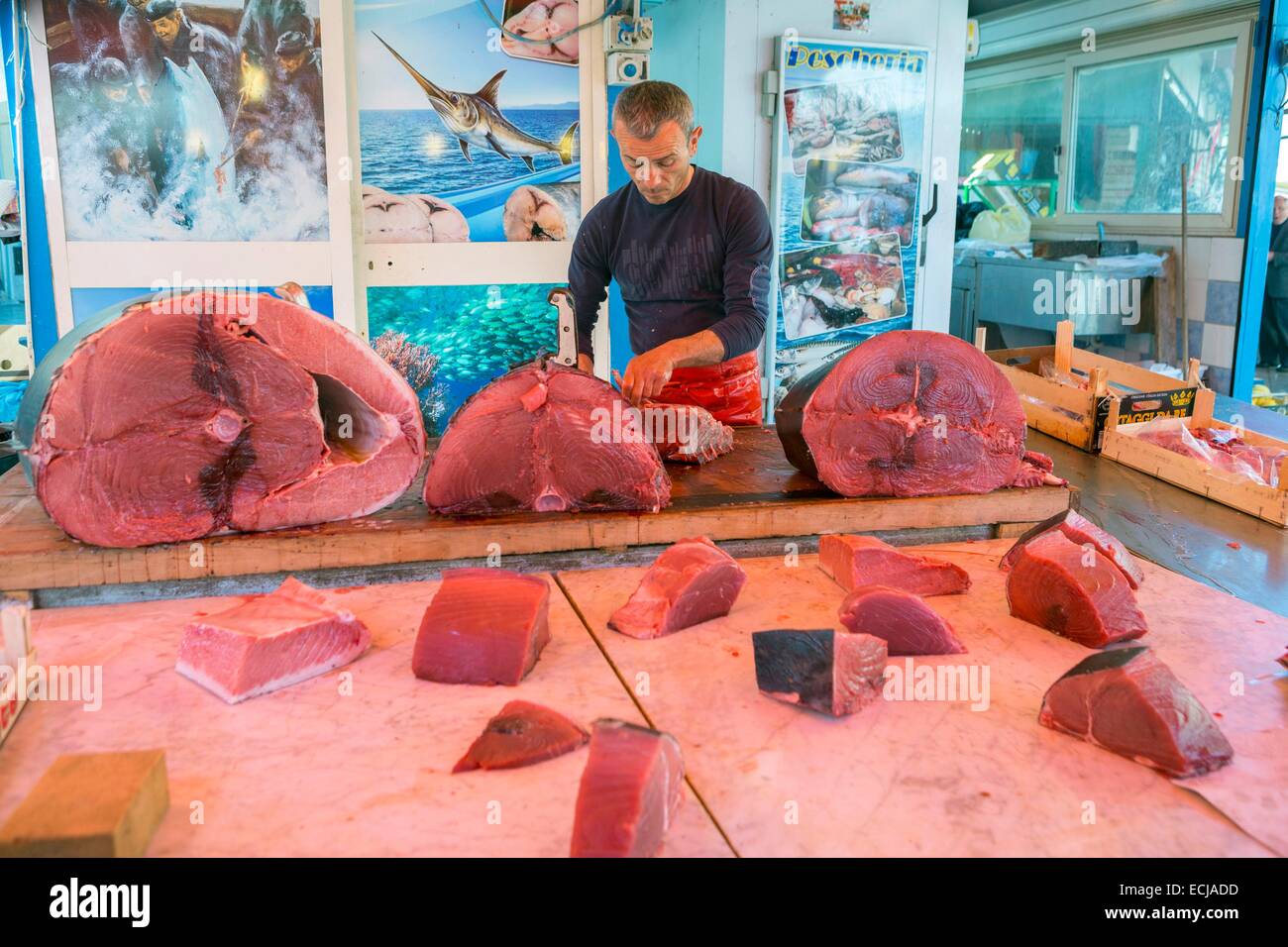 Italy, Sicily, Palermo, Ballaro market, fishmonger, cut bluefin tuna Stock Photo