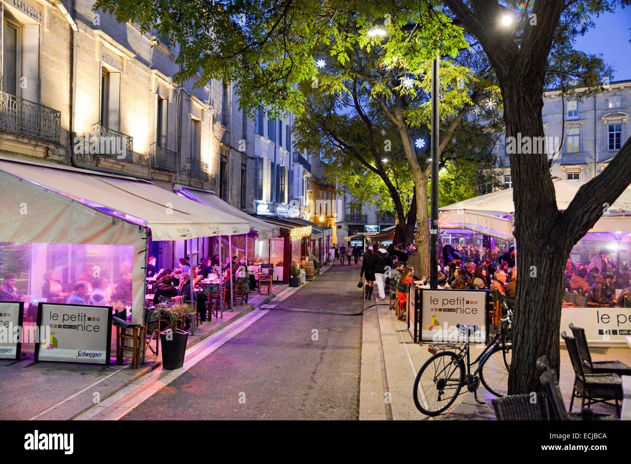 France, Herault, Montpellier, historic center, Jean Jaures place, alley in  the middle of outside terraces of cafes at nightfall Stock Photo - Alamy