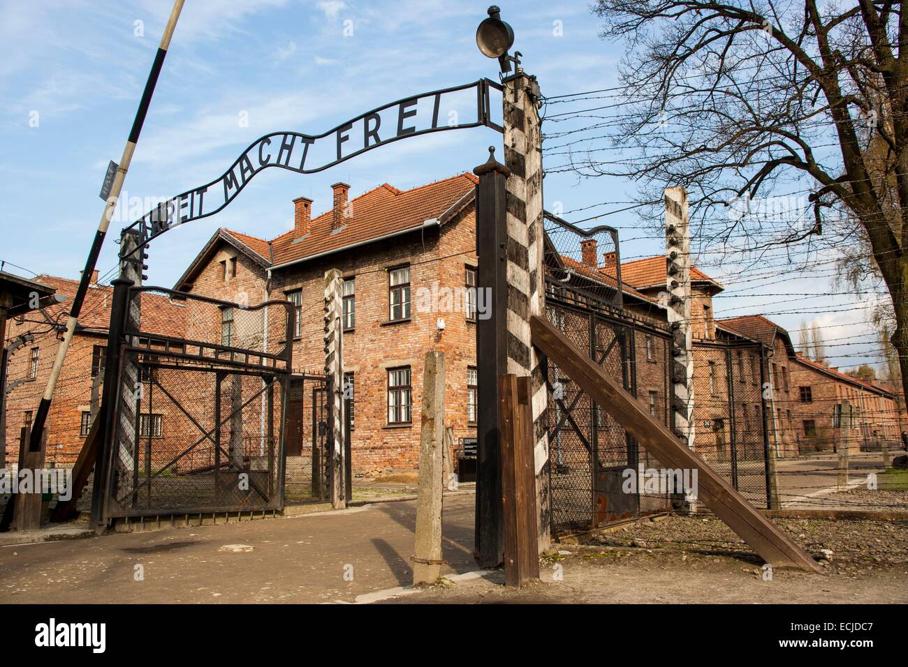 Poland, Lesser Poland, Oswiecim village, Auschwitz Birkenau, German Nazi Concentration and Extermination Camp (1940-1945), listed as World Heritage by UNESCO, the entry of the camp with the maxim Arbeit macht frei (work makes you free) Stock Photo
