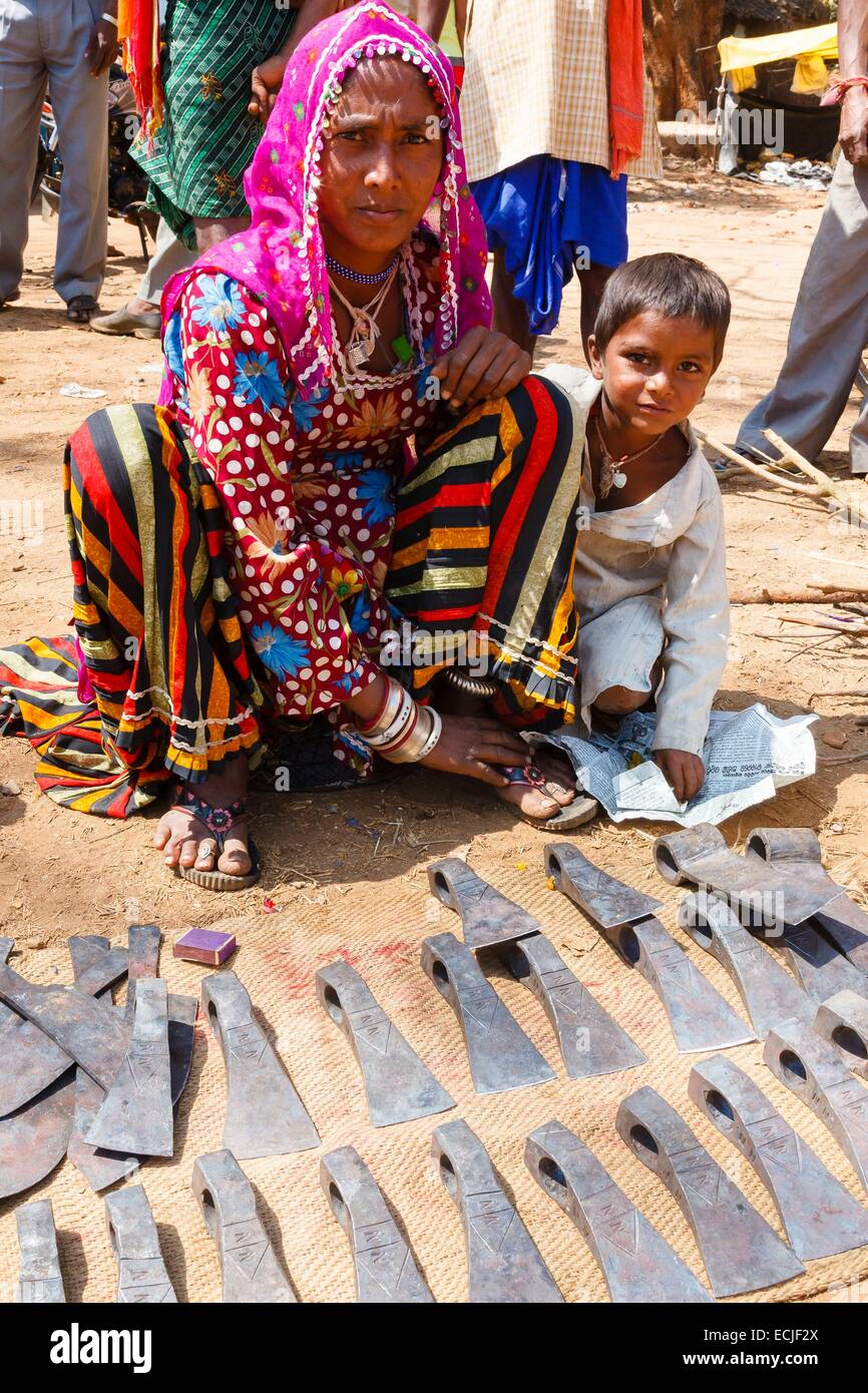 India, Odisha, Dumuriput, banjara (lambadi) family selling tools at the market Stock Photo