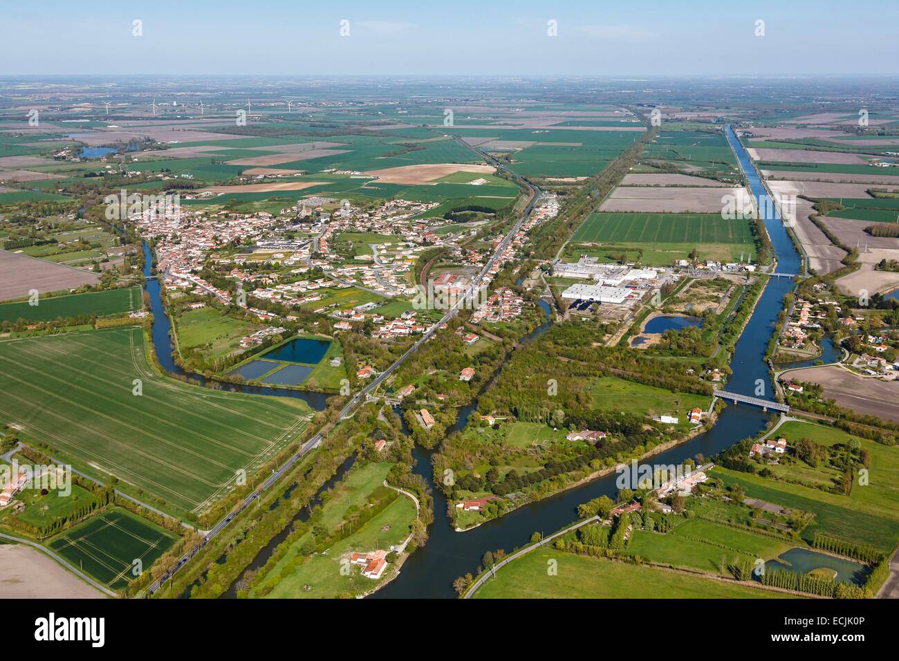 France, Vendee, L'Ile d'Elle, Pomere canal and Vendee river confluence and the village (aerial view) Stock Photo