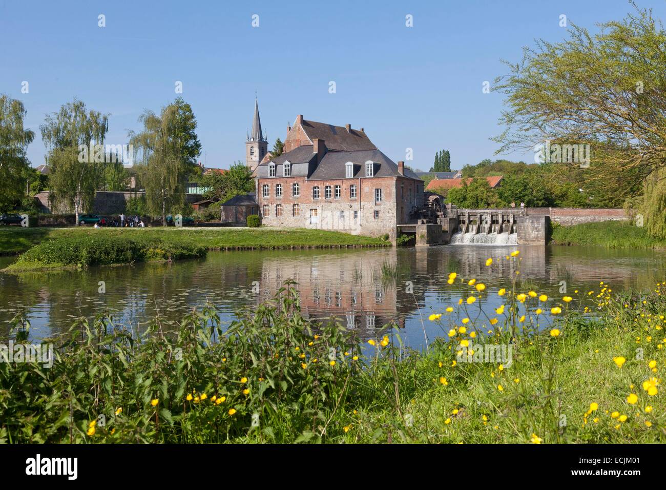 France, Nord, Maroilles, Abbey mill built in the 17th century and the helpe mineure river Stock Photo