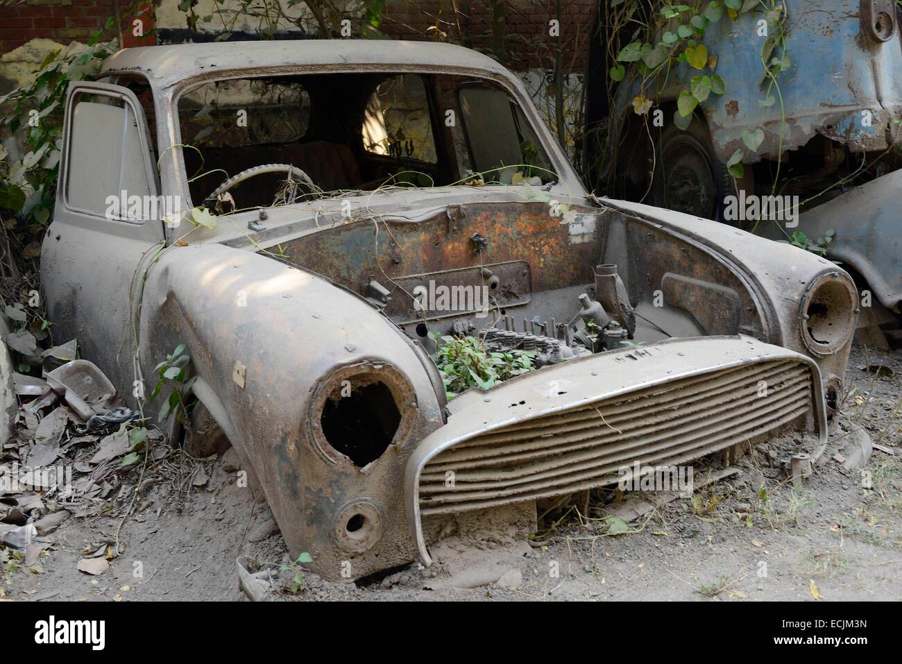 India, Uttar Pradesh, Lucknow, Breaker's yard, Wrecked Ambassador car Stock Photo