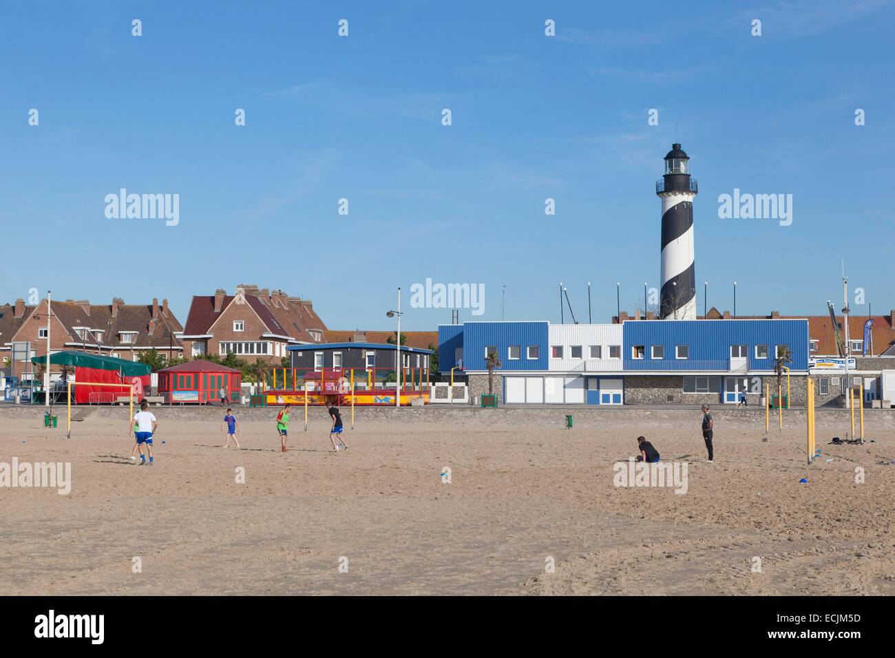 France, Nord, Petit Fort Philippe, beach and lighthouse Stock Photo