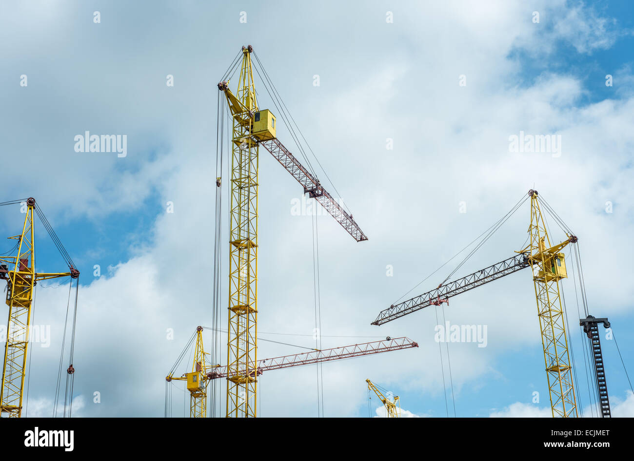 Construction Cranes Against the Sky Stock Photo - Alamy