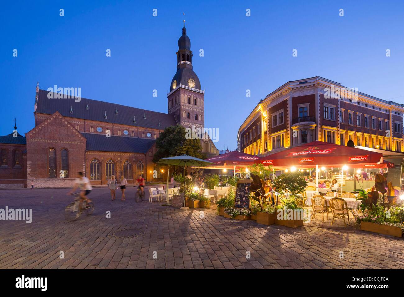 Latvia (Baltic States), Riga, European capital of culture 2014, historical centre listed as World Heritage by UNESCO, terrasses in the city center and the Dome cathédrale Stock Photo