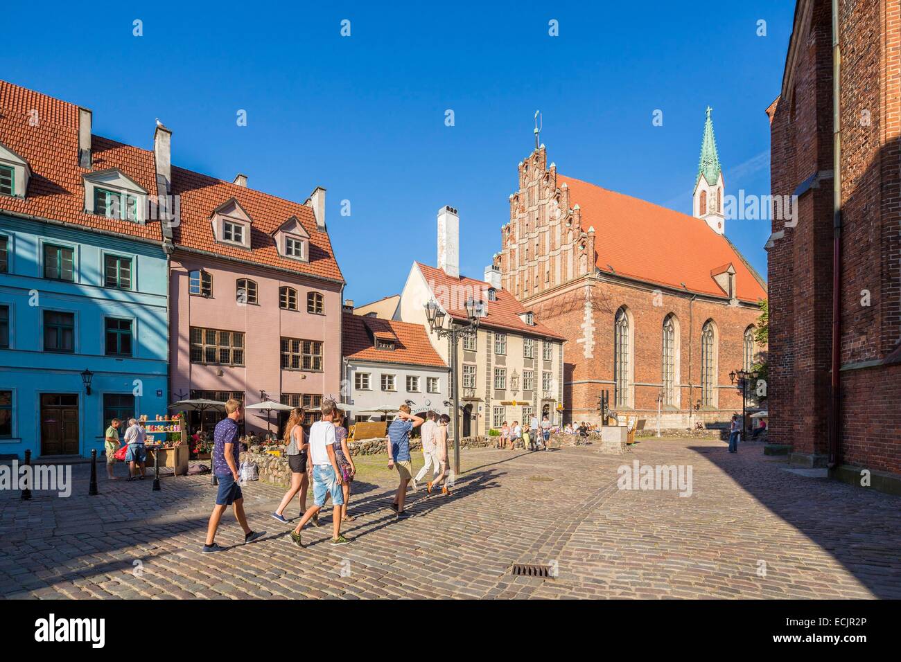 Latvia (Baltic States), Riga, European capital of culture 2014, historical centre listed as World Heritage by UNESCO, old town, street Skarnu and Saint Jhon's church Stock Photo