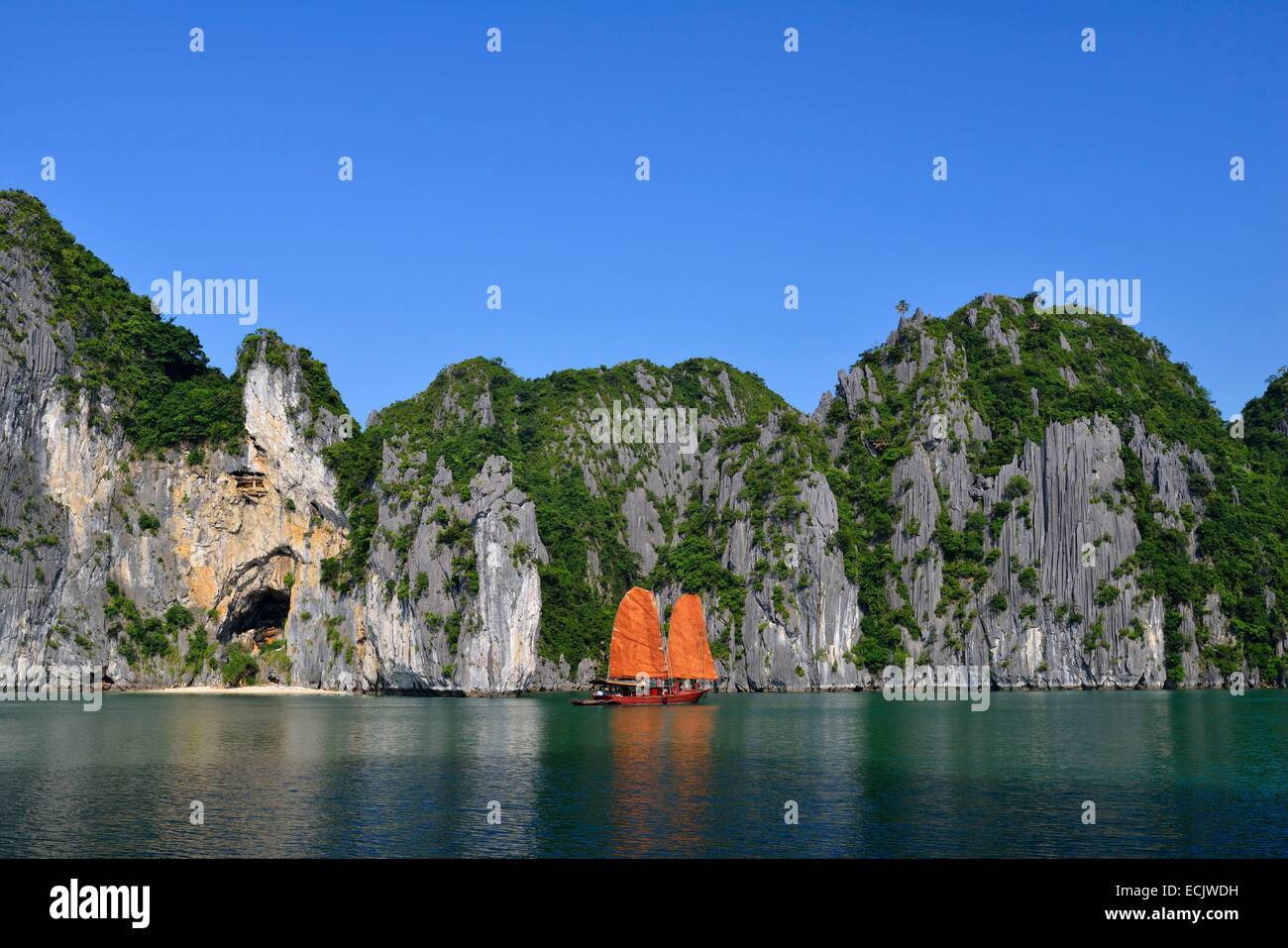 Vietnam, Quang Ninh province, Ha Long bay, listed as World Heritage by UNESCO, junk boat in the bay Stock Photo