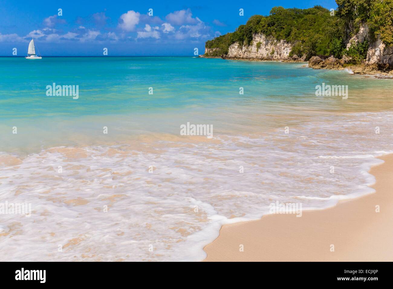 France, Guadeloupe (French West Indies), Marie Galante, Saint Louis, Anse Canot beach with catamaran off Stock Photo