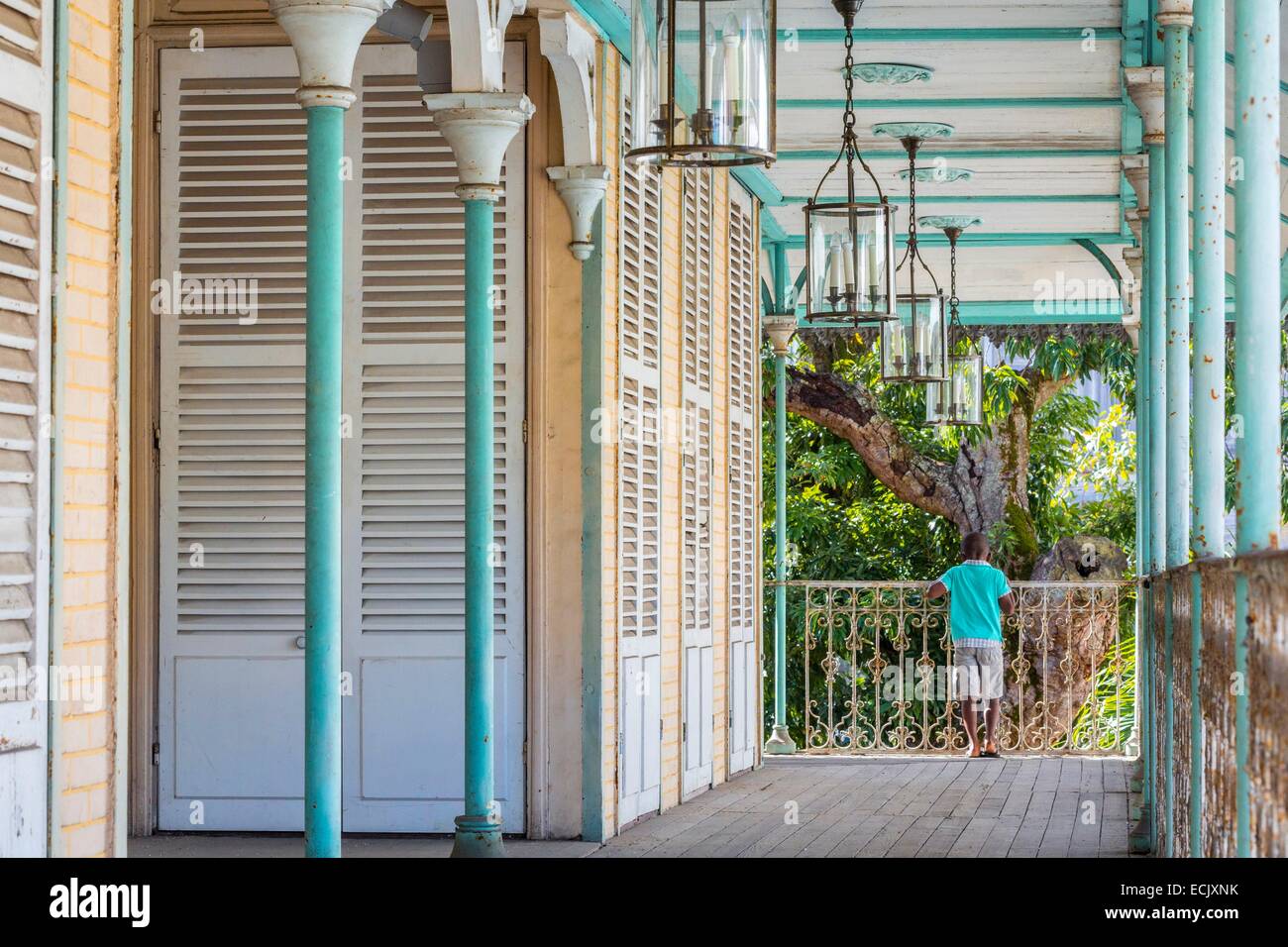 France, Guadeloupe (French West Indies), Grande Terre, Pointe a Pitre, historic district, Saint John Perse museum houses a permanent exhibition on the Creole costumes and on the life of Saint John Perse, long balcony covered the house from 1880 Stock Photo