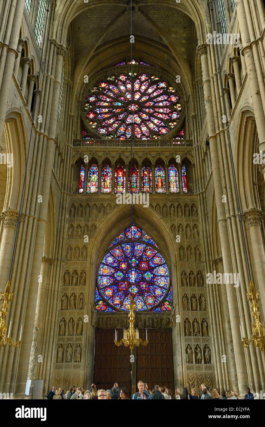 France, Marne, Reims, Notre Dame de Reims cathedral, listed as World Heritage by UNESCO, Royal Portal, the central portal Reverse and the western façade rose window Stock Photo