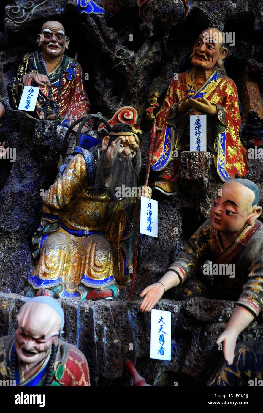 China, Yunnan Province, Kunming, Huating Si temple founded in 1320, a detail of 500 arhats (saints) clay Stock Photo