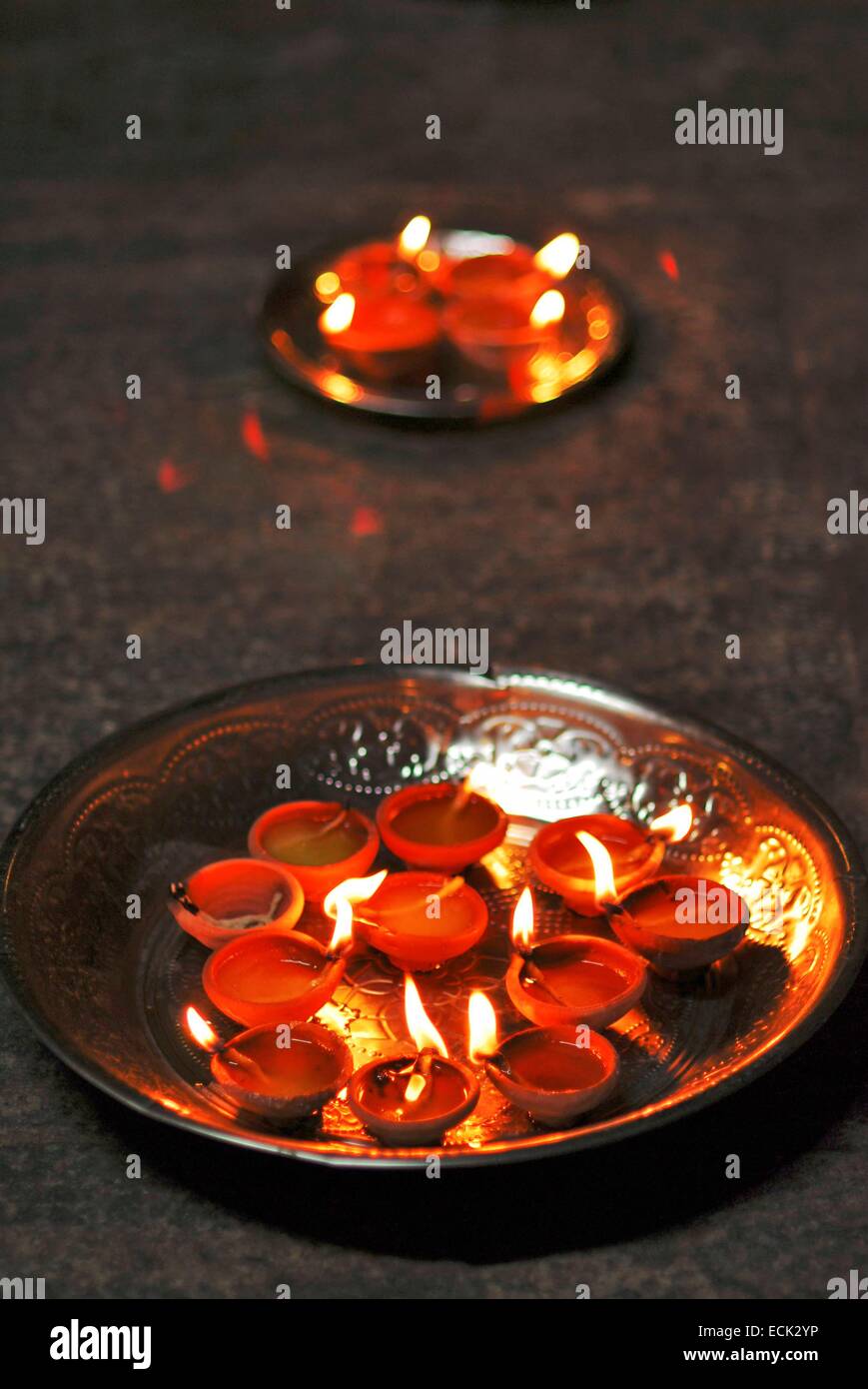 Sri Lanka, Colombo, lighten candles offering for festival. The Tamil