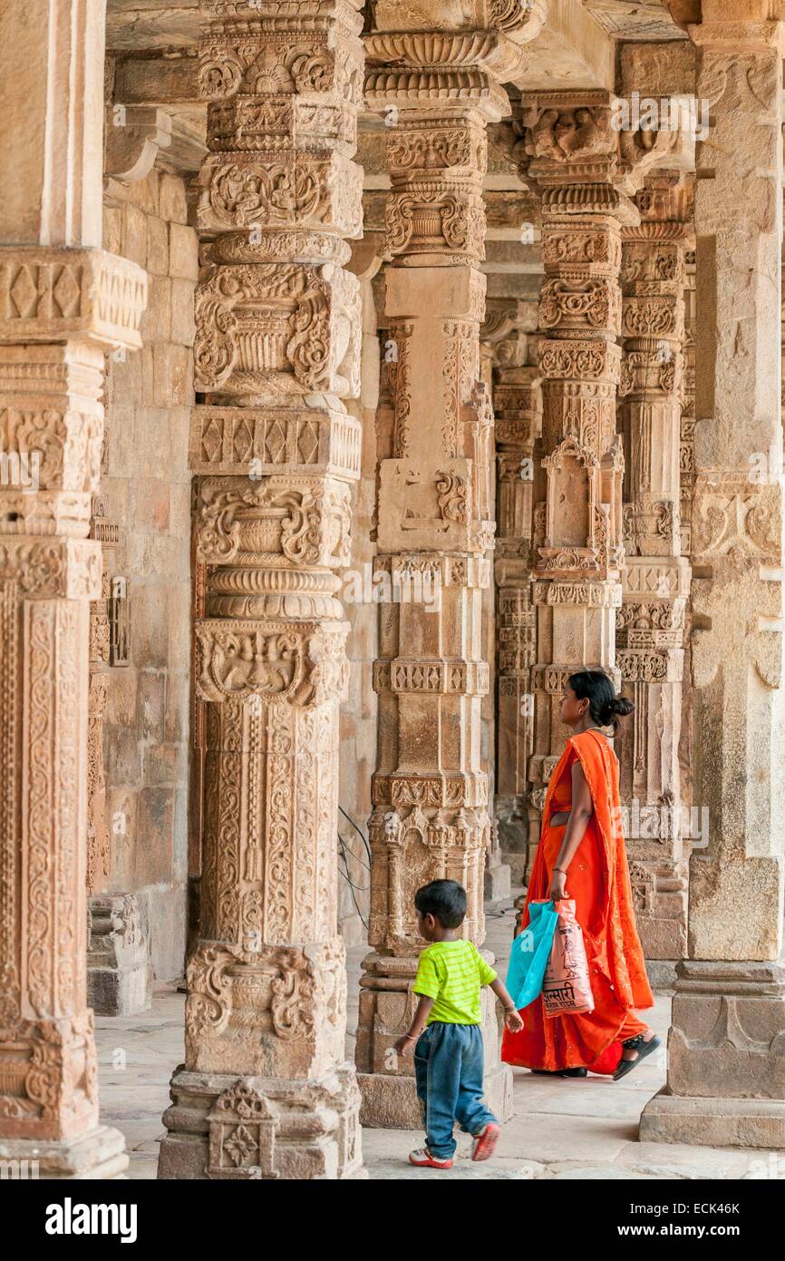 India, New Delhi, Qutab Minar complex listed as World Heritage by UNESCO by UNESCO, Quwwat ul-Islam Mosque with its columns of the 13th century Stock Photo