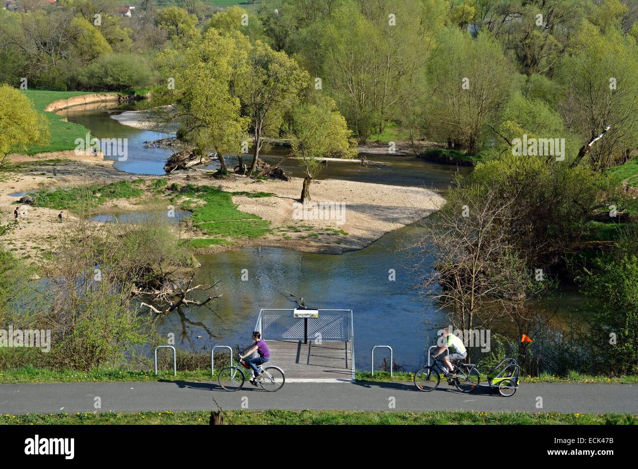 France, Doubs, Allenjoie, family bike ride on the green cast of Montbeliard edge of a wild and natural meander of the river Allan spring Stock Photo