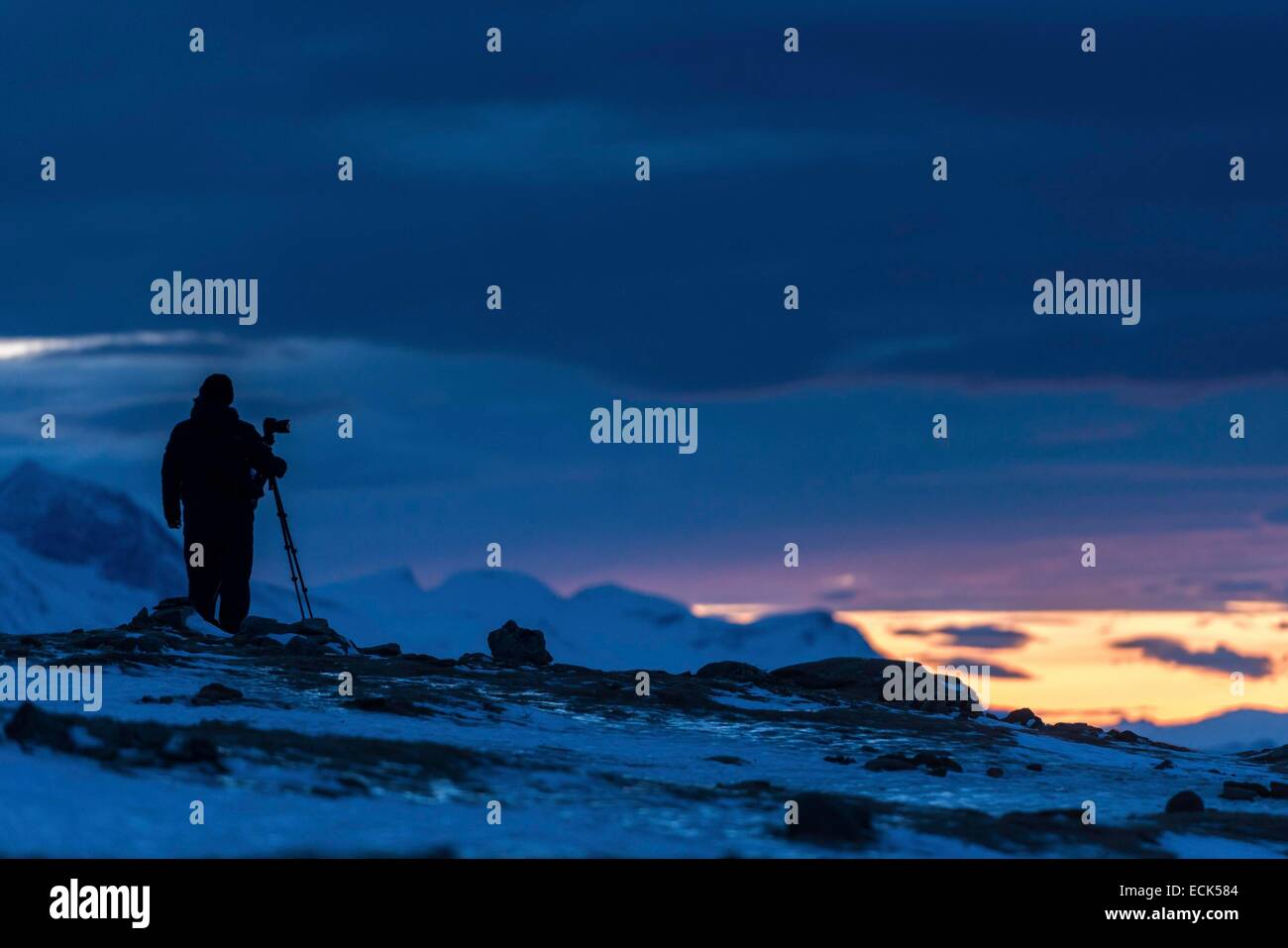 Norway, Lapland, Troms, Tromso, photographer at twilight Stock Photo