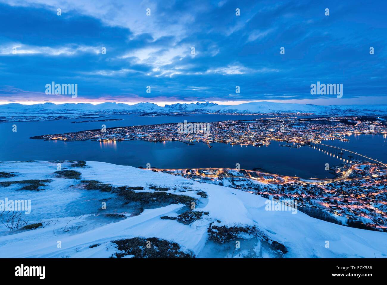 Norway, Lapland, Troms, Tromso, the city at dusk from Mount Storsteinen ...