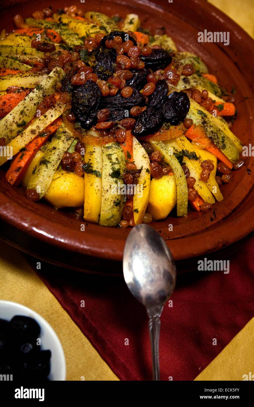 Morocco, Anti Atlas, Draa Valley, Agdz, a village on the road from Marrakech to Tomboctou or Timbuktu, traditional restaurant with traditional Morocco cuisine in an old house outside of Agdz. The typical Morocco Tajine Stock Photo