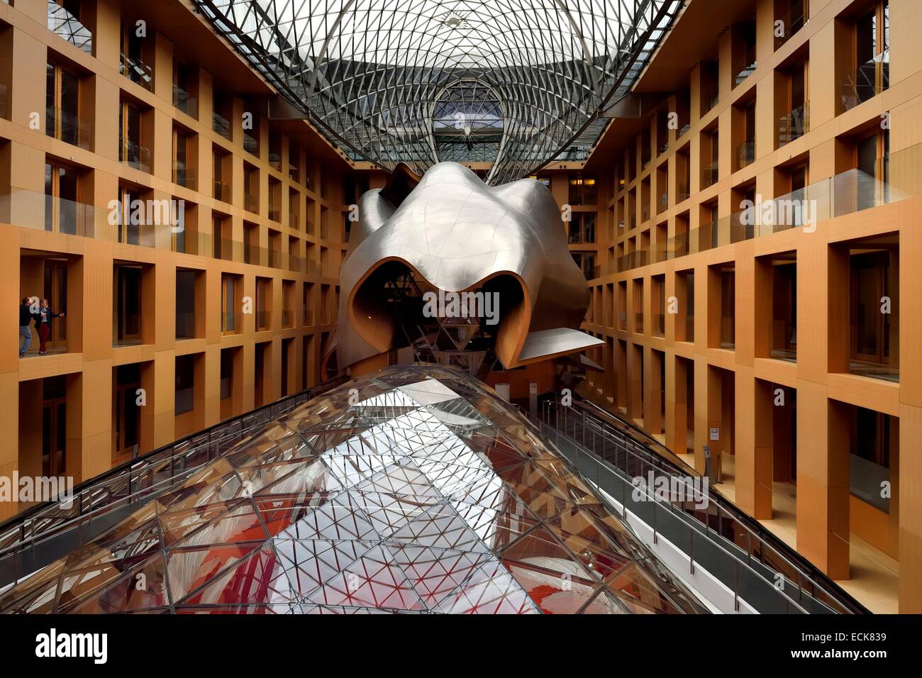 Germany, Berlin, Pariser Platz, DZ Bank (former DG Bank) head office, large atrium designed by architect Franck Gehry, huge steel sculpture which shelters a conference room Stock Photo