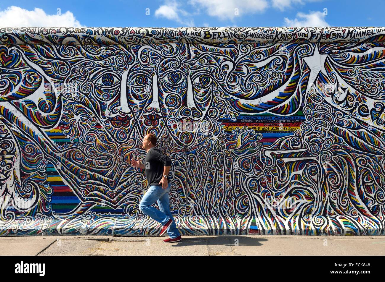 Germany, Berlin, Friedrichshain-Kreuzberg, East Side Gallery, The Wall, work by artist Schamil Gimajew dating from the 1990's renovated in 2009 Stock Photo