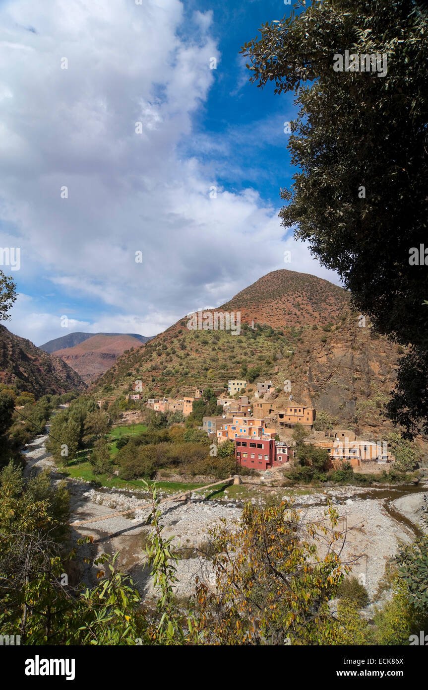 Vertical view of a small Berber village nestled on the slopes of the High Atlas Mountain range in Morocco. Stock Photo