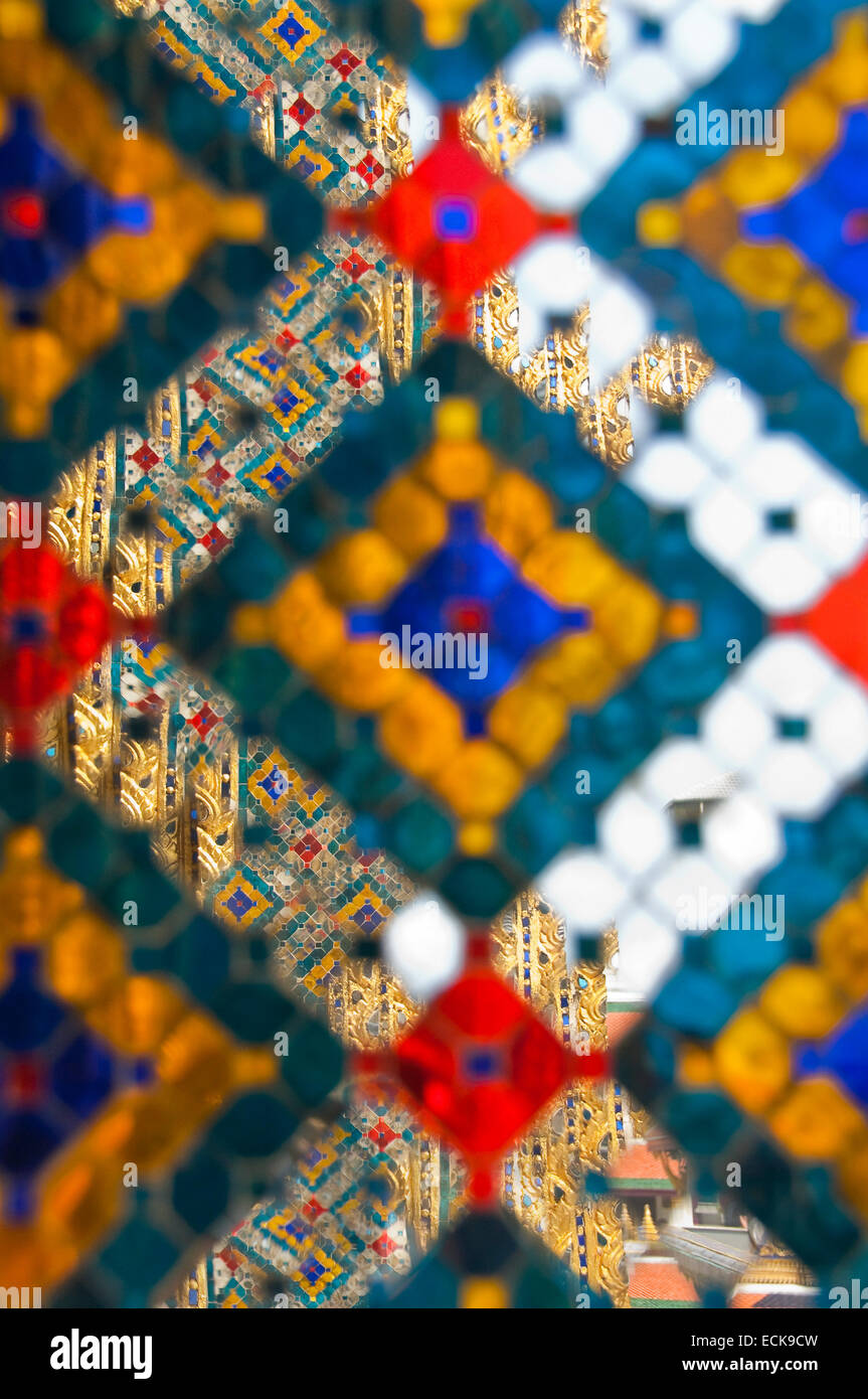 Vertical close up of the mirrored mosiac decoration in the Grand Palace in Bangkok. Stock Photo