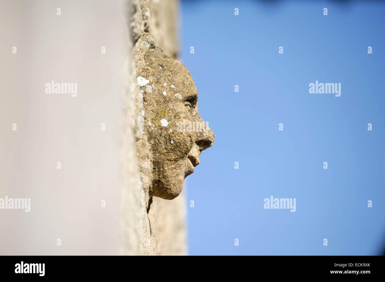 France, Ardennes, Launois sur Vence, horses' post office dating from the 17th century, carving of a face on the entrance wall Stock Photo
