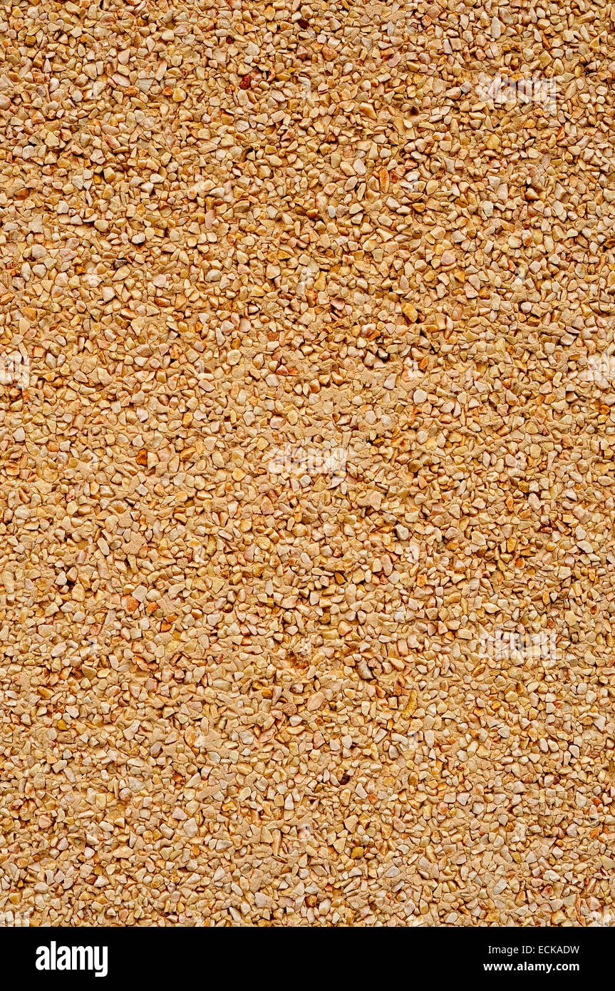 background made of a closeup of a wall with a dry dash aggregates coating Stock Photo