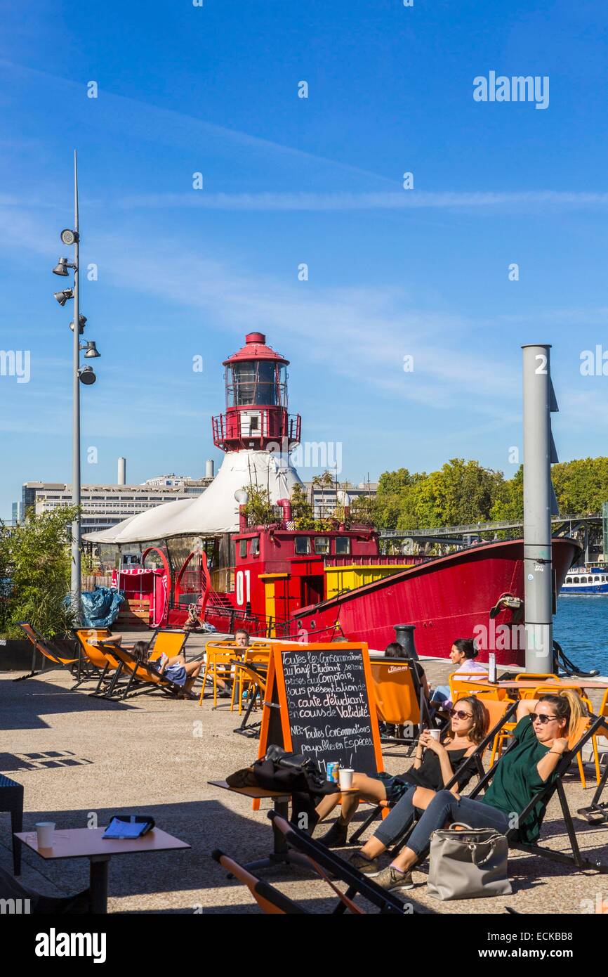 France, Paris, the Seine in the 13th arrondissement, the Batofar red and a bar beach summer Stock Photo