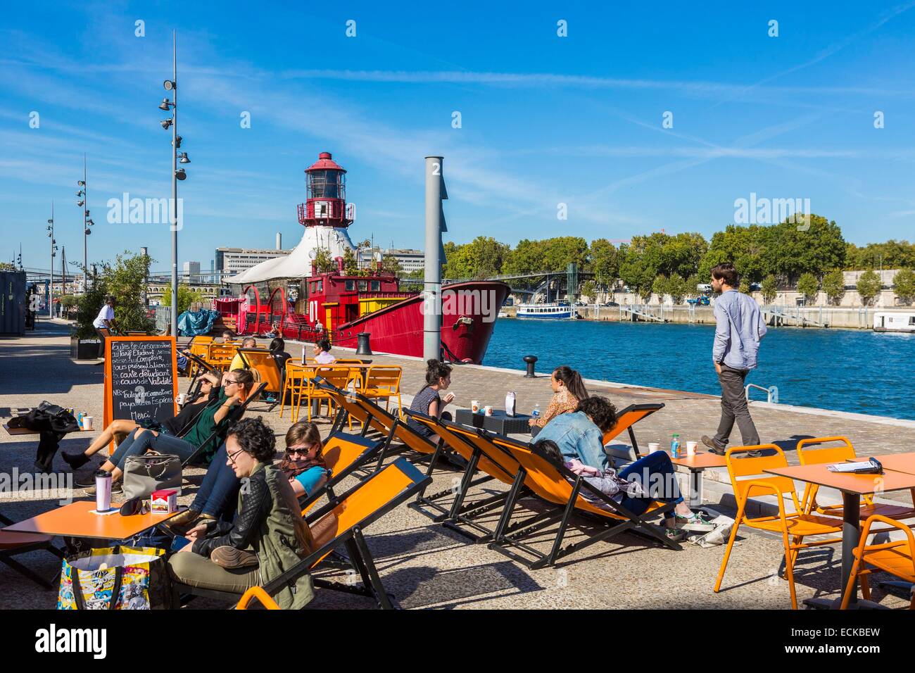 France, Paris, the Seine in the 13th arrondissement, the Batofar red and a bar beach summer Stock Photo